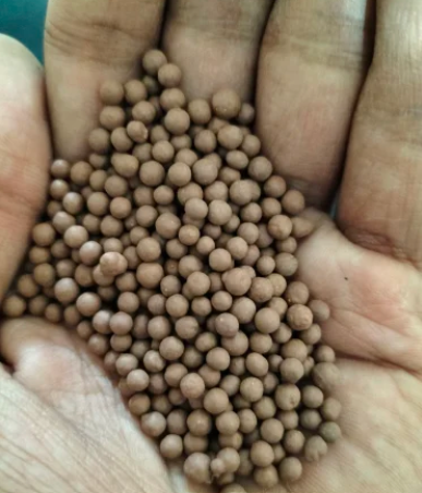 Brown Bentonite Granules Handful